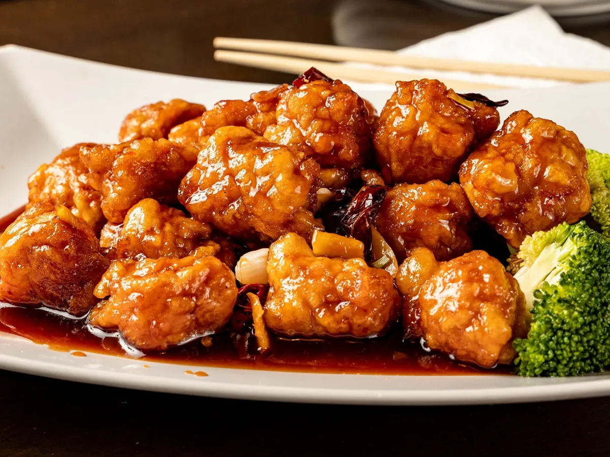 Braised spicy crispy chicken chunks with rich glossy sauce at China a Go Go, a Japanese Restaurant in Henderson