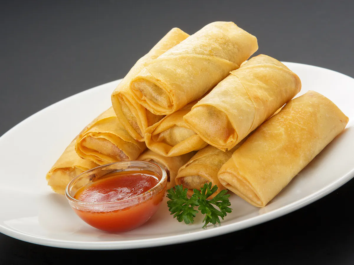 Crispy fried spring rolls served with sweet chili dipping sauce at China a Go Go, a Chinese Restaurant in Henderson