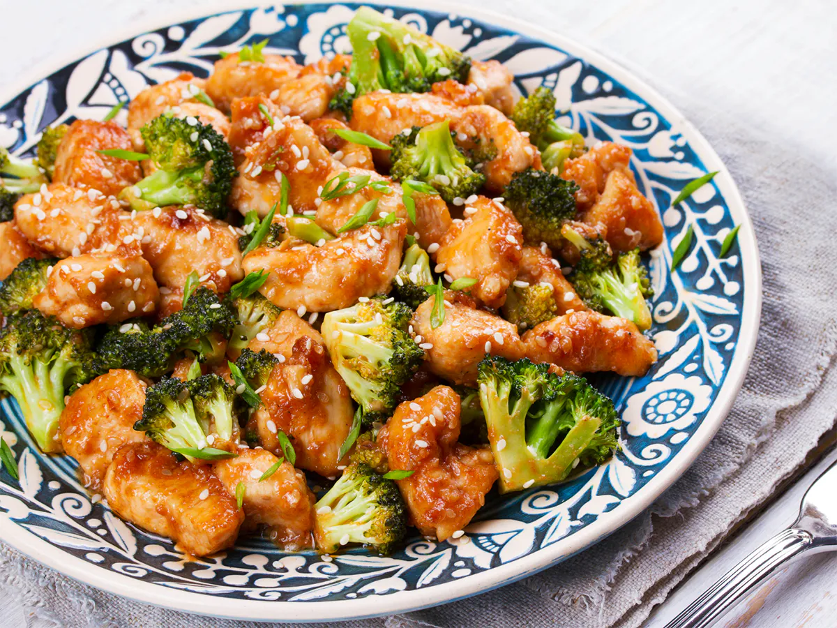 Glazed sesame chicken stir-fried with crisp broccoli florets at China a Go Go, a Chinese Restaurant in Henderson